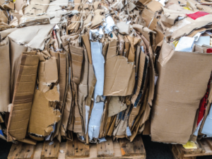 A stack of compressed, baled cardboard.