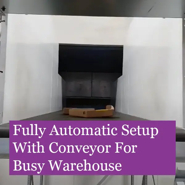 Fully-Automatic-Baler-With-Conveyor Tipping large cages full of cardboard into baler