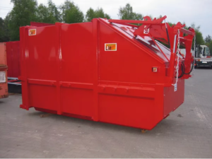 Model AS Skip Portable Compactor in red from a side profile outside.