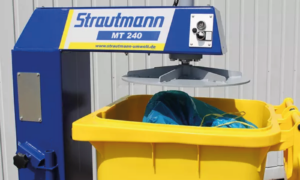 The MT240 wheelie bin compactor plate over a full wheelie bin, ready to press the waste down.